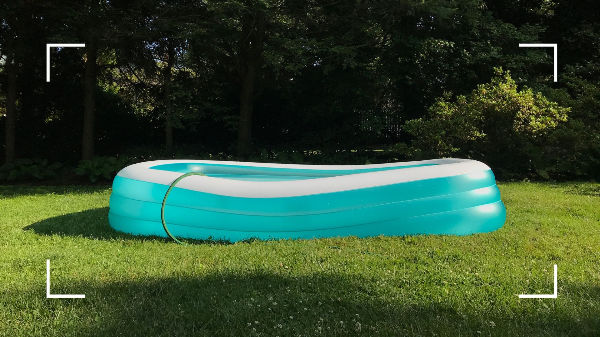 picture of inflatable paddling pool in garden 
