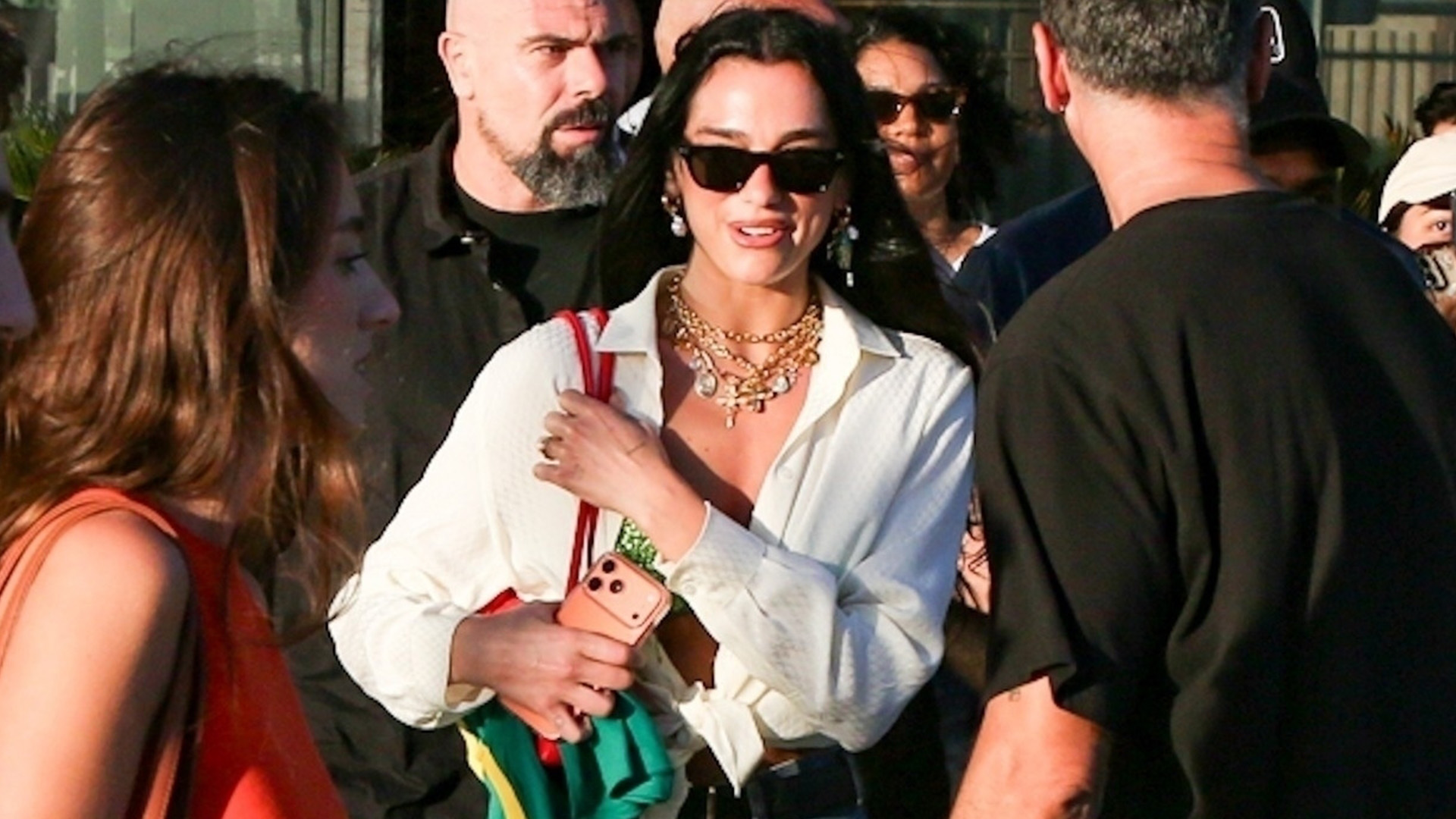 Dua Lipa in jeans and sneakers