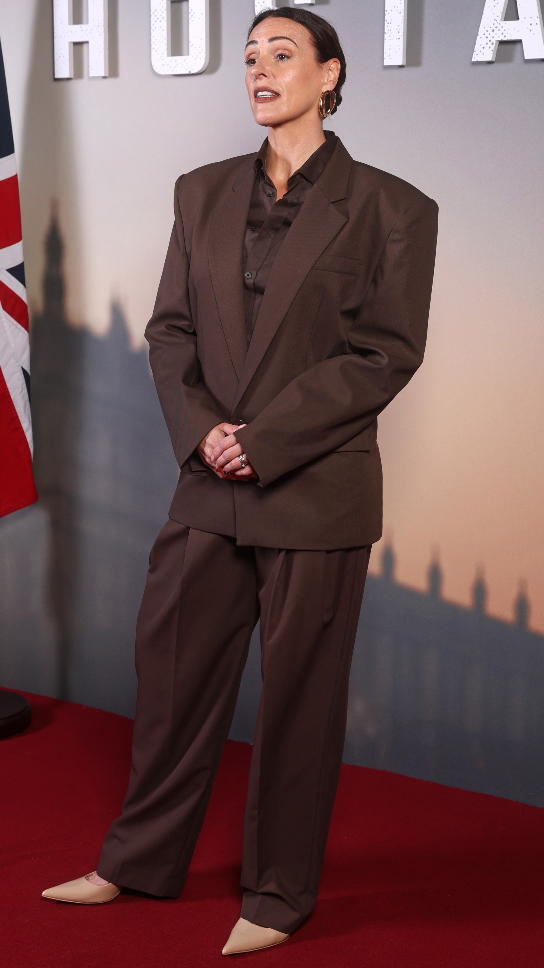 Suranne Jones poses for photographs as she attends the "Hostage" UK screening at The Ham Yard Hotel on August 18, 2025
