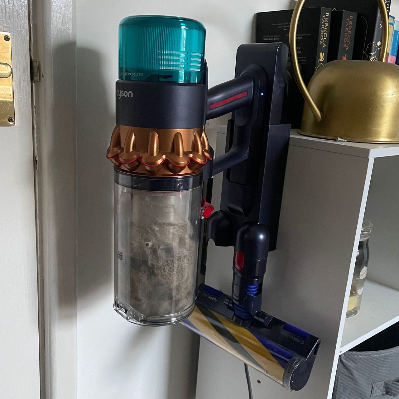 Dyson Gen5detect sitting in the charging wall dock