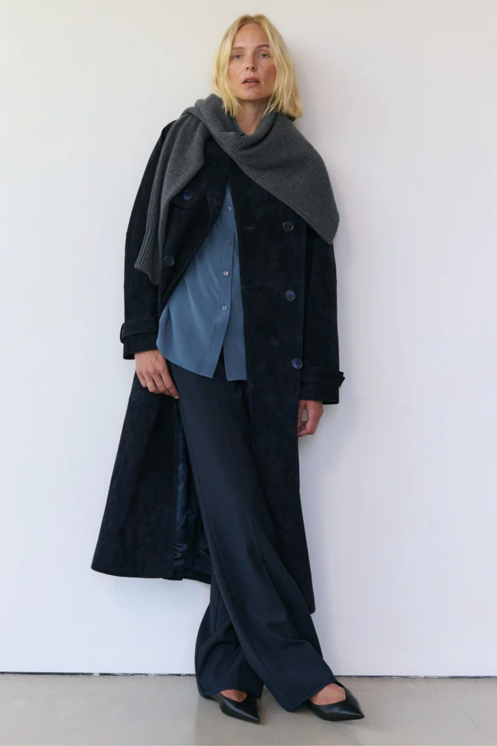 Rise &amp;amp; Fall sustainable clothing brand - model wears navy shirt, coat and trousers