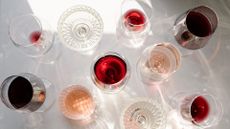 top view of different types of wine glasses with different types of wines inside