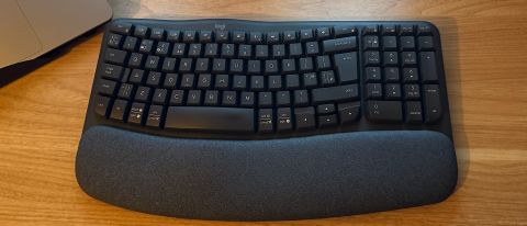 Logitech Wave Keys keyboard on wooden desk
