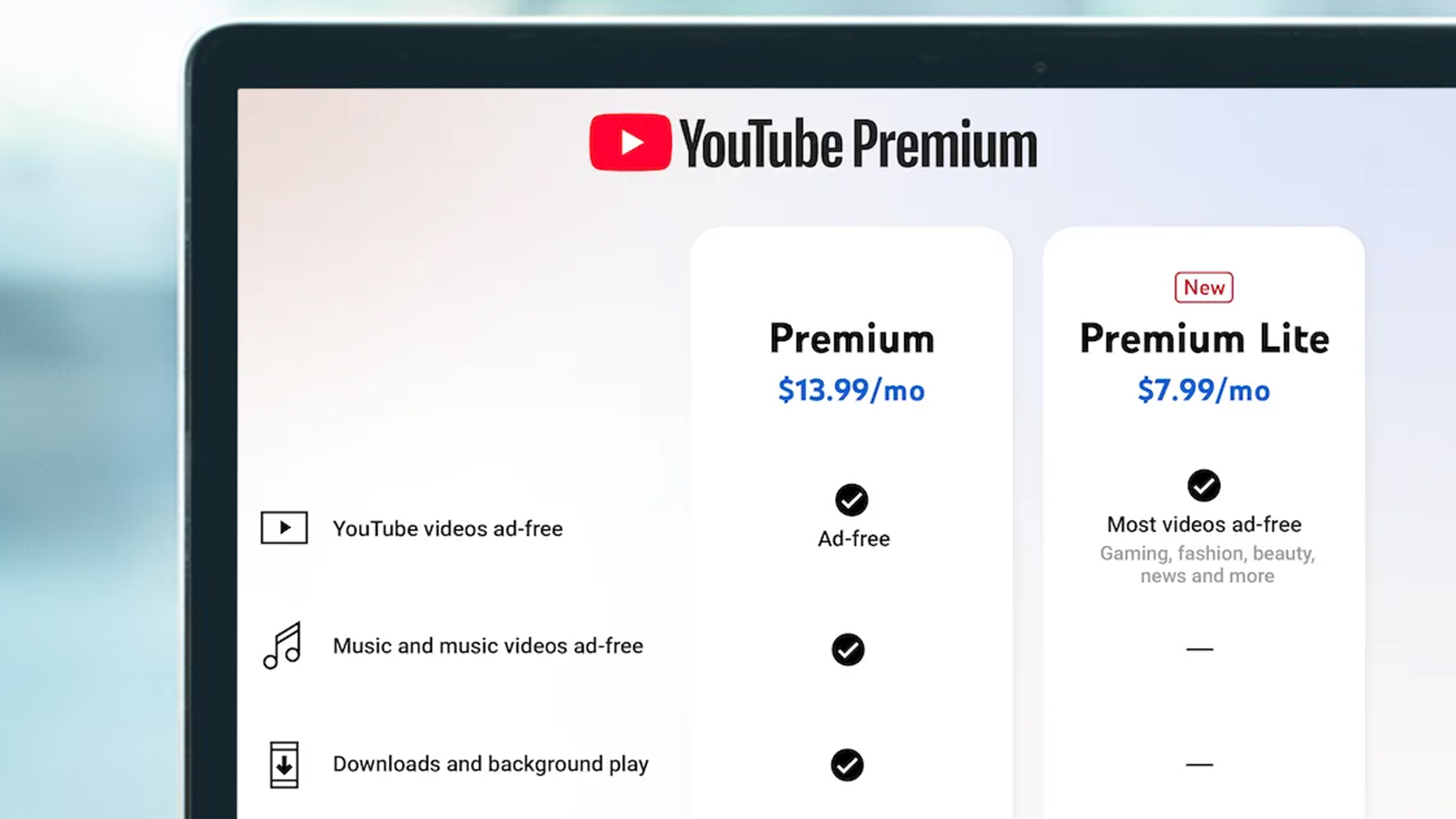 A laptop screen showing a comparison between Premium and Premium Lite