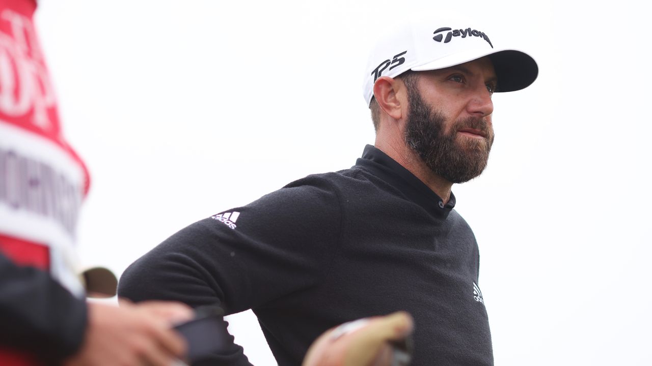 Dustin Johnson looks on at The Open