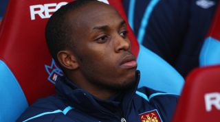 LONDON - FEBRUARY 08: Savio Nsereko of West Ham United looks on from the bench ahead of the Barclays Premier League match between West Ham United and Manchester United at Upton Park on February 8, 2009 in London, England. (Photo by Ryan Pierse/Getty Images)