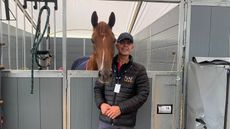 Tom McEwen&rsquo;s groom Adam Short and CHF Cooliser at Burghley