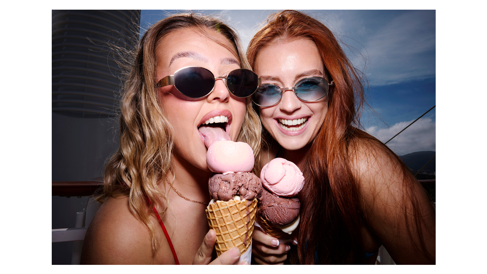 Photograph of two female models eating ice cream, taken by British photographer Rankin as part of a creative collaboration with cruise line operator P&O Cruises titled On Board with Rankin