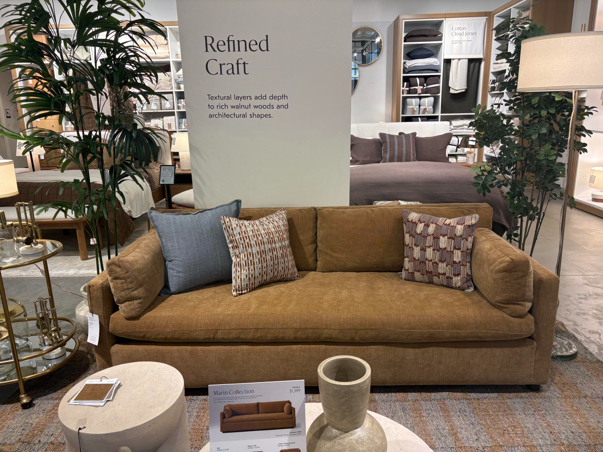 A camel-colored West Elm sofa.