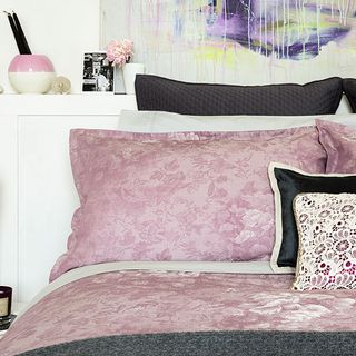 bedroom with pink bad linen