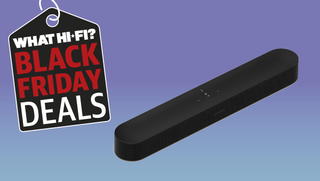 Sonos Beam Gen 2 soundbar on a purple background with a tag reading "What Hi-Fi? Black Friday deals"