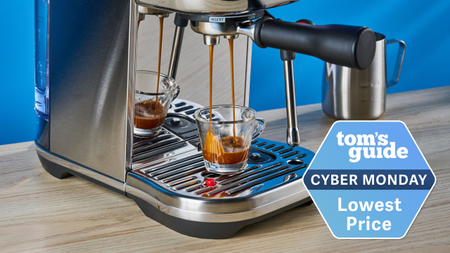 the breville bambino plus / sage bambino plus photographed making espresso with a cyber monday lowest price deal badge