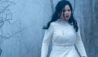 Monsterland Kelly Marie Tran makes her way through a foggy forest