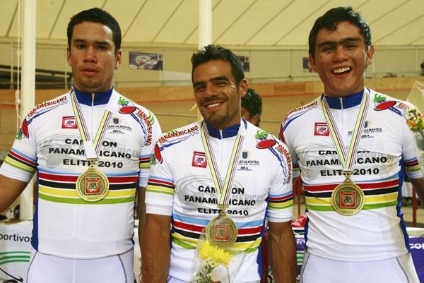 The very happy Colombian men's team sprint squad with their gold medals