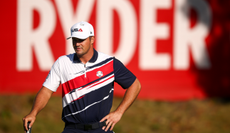 Bryson DeChambeau watches a putt