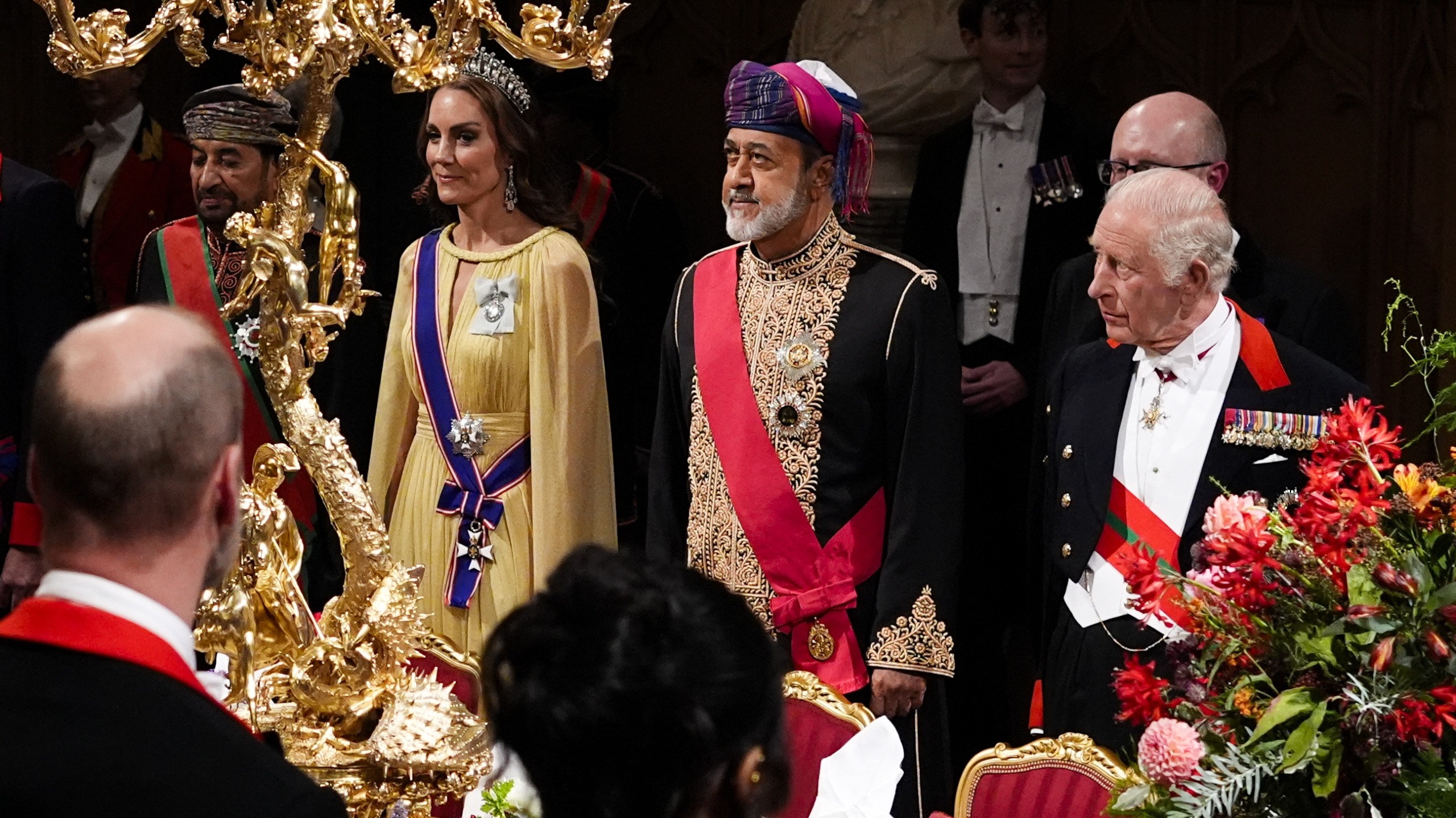 Oman's Sultan stands with Catherine, Princess of Wales (L) and King Charles III during the State Banquet at Windsor Castle, Windsor, on October 20, 2026,