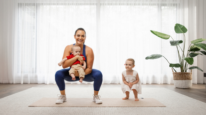 Postpartum workout: Emily Skye doing a workout with her children