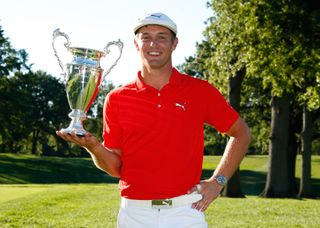 Bryson DeChambeau poses with the DAP Championship trophy after winning on the Web.com Tour in 2016