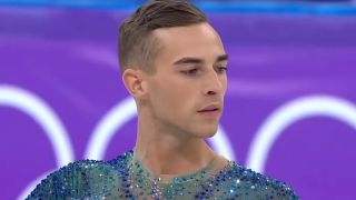 Adam Rippon gets ready to begin his program at the 2018 Olympics.