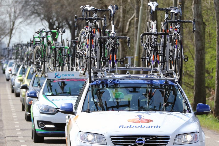 A long row of team cars