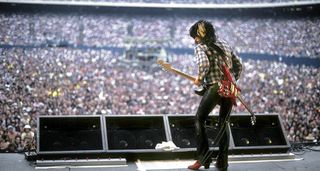 Joe Perry of Aerosmith takes a casual solo in front of a packed football stadium. This is the view that drummer Joey Kramer would have had of proceedings.