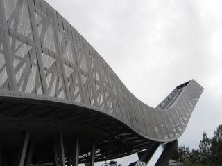 A view of the structure of a grey ski jump