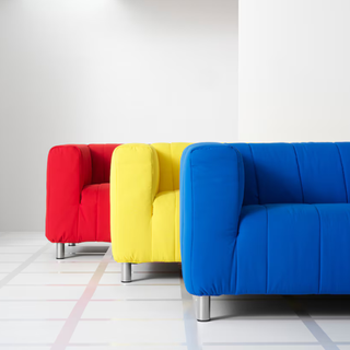 IKEA set of three KLIPPAN sofas in red, yellow and blue.