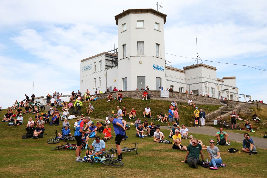LLANDUDNO SEPTEMBER 08 Spectators waiting for the peloton at The Great Orme a limestone headland on the north coast of Wales during the 17th Tour of Britain 2021 Stage 4 a 210km stage from Aberaeron to Great Orme Llandudno 1306m TourofBritain TourofBritain on September 08 2021 in Llandudno United Kingdom Photo by Alex LiveseyGetty Images
