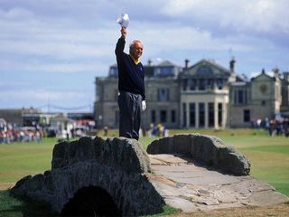 21 Jul 1995: Arnold Palmer of the USA waves to the crowd from the Swilken Bridge on the 18th hole during the second round of the British Open at St Andrews in Scotland. This proved to be a farewell from Palmer as shortly after the round he announced this would be his last British Open appearance. Mandatory Credit: Stephen Munday /Allsport
