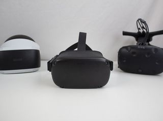 Oculus Quest in front of HTC Vive and PSVR