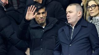 Prime minister Rishi Sunak waves to fans during Southampton's game against Plymouth Argyle in December 2023.