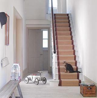 hallway with stair runner