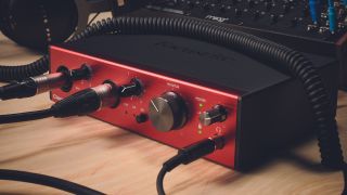 A Focusrite audio interface sitting on a desk