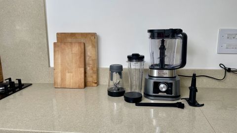 Ninja Foodi Power Blender & Processor System and attachments on a counter
