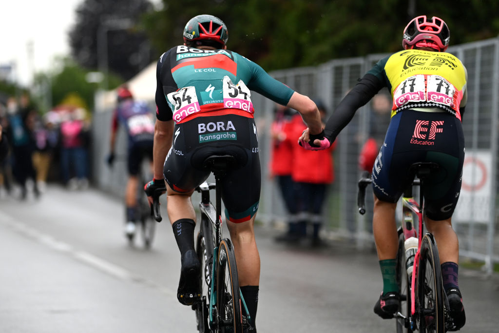 CASSANO MAGNAGO ITALY MAY 20 LR Nico Denz of Germany and Team BORA hansgrohe and Alberto Bettiol of Italy and Team EF EducationEasyPost congratulate each other after cross the finish line in the 106th Giro dItalia 2023 Stage 14 a 194km stage from Sierre to Cassano Magnago UCIWT on May 20 2023 in Cassano Magnago Italy Photo by Tim de WaeleGetty Images