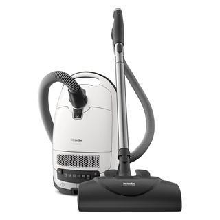 A Miele C3 Cat and Dog canister vacuum in lotus white