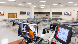 A lectern geared up with Extron AVoIP collaboration solutions at UTEP. 