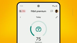 A phone on an orange background showing the Fitbit app