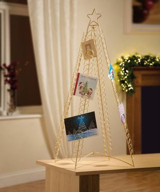 Folding floor standing christmas card holder that holds up to 100 cards