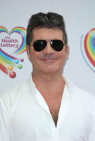 A picture of Simon Cowell at a showbiz event