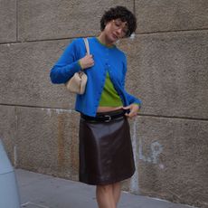 @alyssainthecity wearing colored T-shirts under sweaters