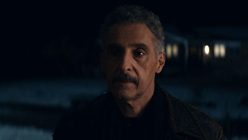 Irving standing on a porch at night in Severance season 2 episode 6