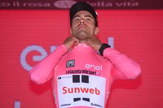 Tom Dumoulin putting on the pink jersey after stage 13 of the Giro d'Italia
