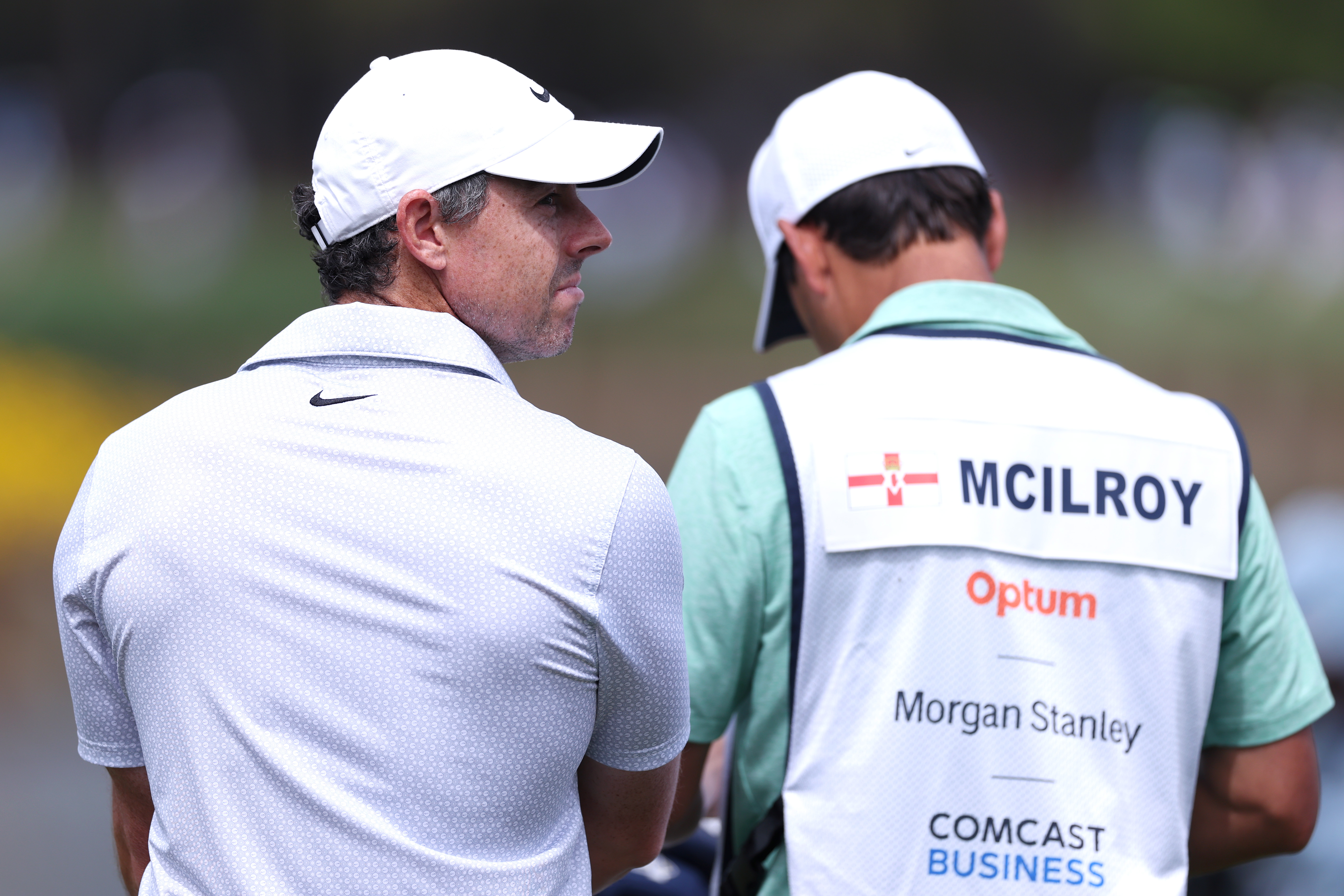 PONTE VEDRA BEACH, FLORIDA - MARCH 14: Rory McIlroy of Northern Ireland and his caddie, Harry Diamond, look on from the 17th tee during the third round of THE PLAYERS Championship 2026 at THE PLAYERS Stadium course at TPC Sawgrass on March 14, 2026 in Ponte Vedra Beach, Florida. (Photo by Kevin C. Cox/Getty Images)