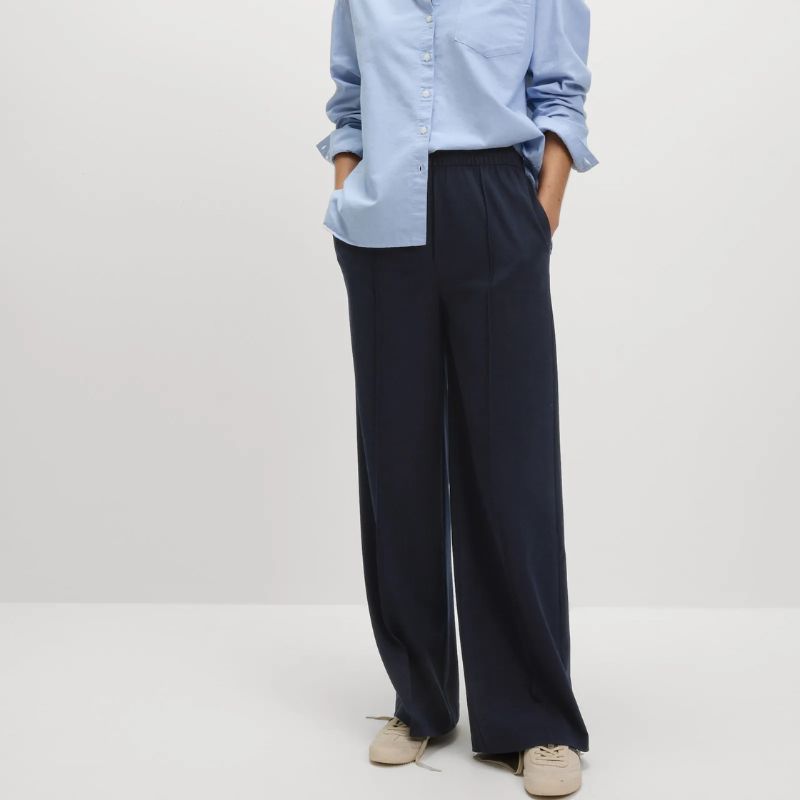 M&amp;amp;S navy Wide Leg Trousers on model 