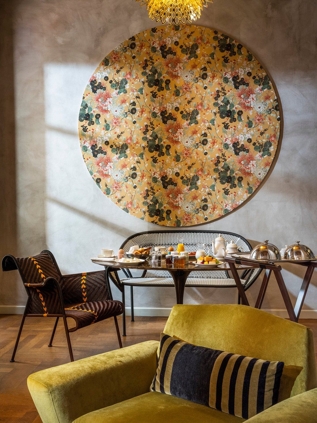 An eccentrically decorated hotel features brutalist architectural elements elevated by colorful, bold interiors.
