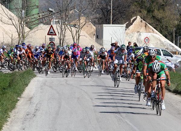 Riders go down in a right-hander.