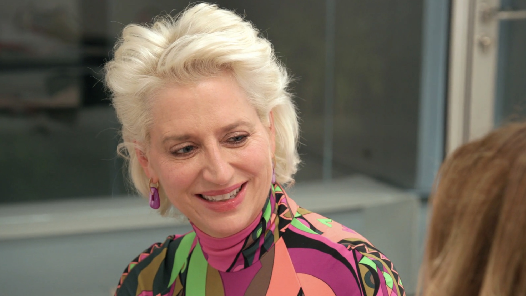 Dorinda smiling talking to Kelly on Ultimate Girls Trip.