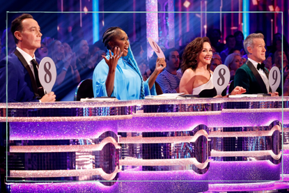 Strictly Come Dancing Judges holding paddle scores