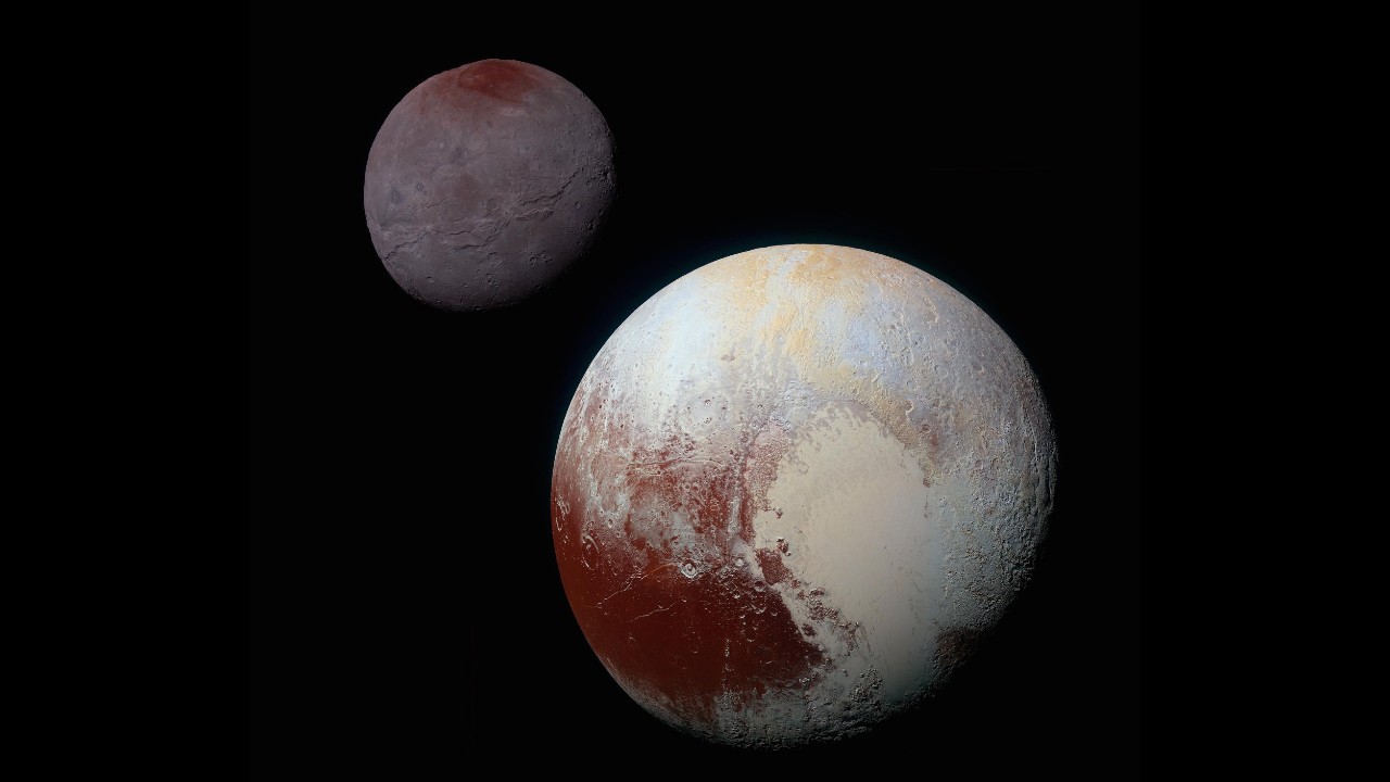 An image of Pluto in the foreground and Charon in the background.